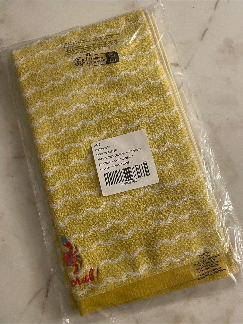 Holy Crab Icon Embroidered Hand Towel from Anthroplologie
